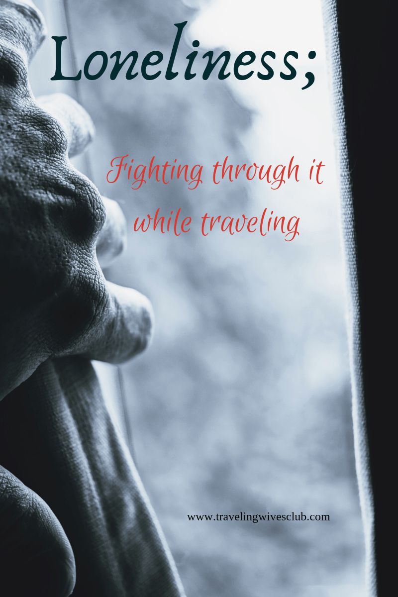 hand pulling back a curtain