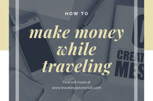 cell phone, ear buds, book and pen scattered on a desk